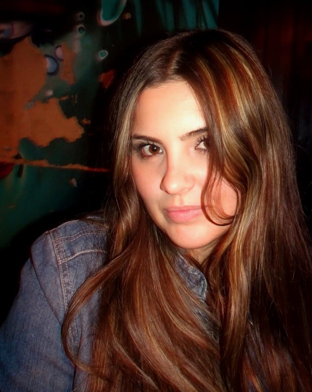Close-up portrait of Brooke Dawn wearing a denim jacket